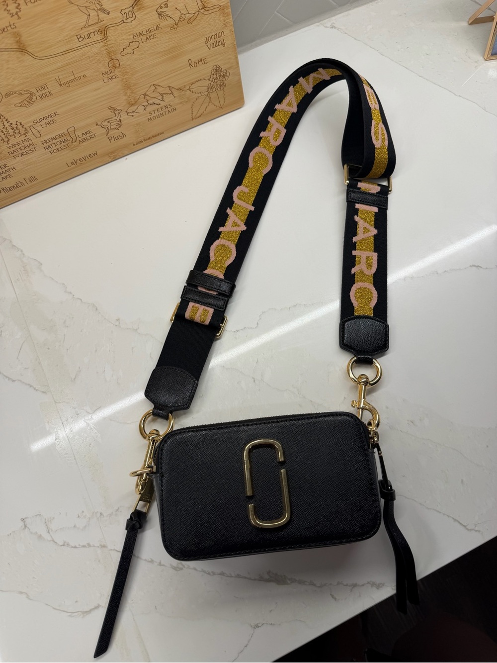 Marc Jacobs Black Snapshot Camera Bag with Gold Hardware and Branded Strap